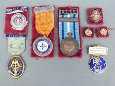 A collection of Rotary, 41 club and other medals, badges etc.
