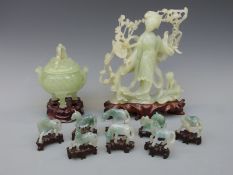 Eleven jadeite and hardstone carvings including a young woman, lidded censer,