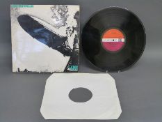 Led Zeppelin first album in rare turquoise lettered sleeve.