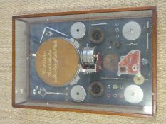 A Collaro D30 deconstructed wind up gramophone in glass display case.