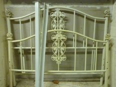 A painted metal double bed with hollow globe finials (W122cm)
