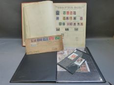A Schaubek album of mainly Victorian all world stamps and other sundry stamps