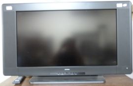 A Digihome flat screen television with remote