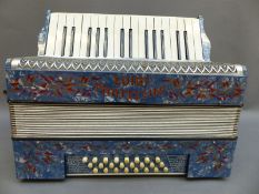 Luigi Fratellini 24 brass piano accordion in light blue pearloid finish with diamanté decoration
