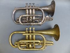 Two cornets one by Boosey and Co Acme model Sileron no 127993, the other a brass example by J.