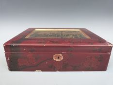 A Chinese lacquer games box with a transfer printed photo to lid