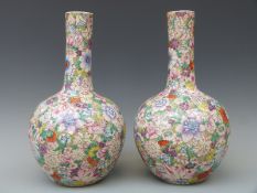 A pair of Chinese late 19th/ early 20thC millefiori bottle vases, Qianlong mark to base, 36.