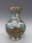 An 18th/19thC Chinese cloisonne pedestal vase with dragon decoration,