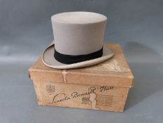 A grey felt top hat by Lock & Co London, boxed, internal size approx. approximately 19cm x 15.5cm.