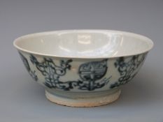 A Chinese blue and white footed bowl, from the Tek Sing cargo wreck of 1822,