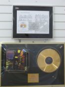 Ziggy Stardust framed limited edition Gold LP disc and a similar Bohemian Rhapsody display