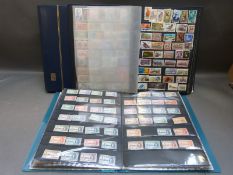 Three stockbooks of Commonwealth stamps,