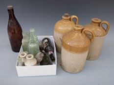 A quantity of collectable bottles and stoneware jars to include Cheltenham, Stroud,