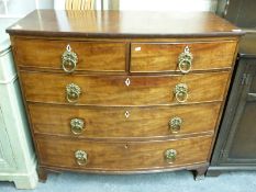 A 19thC mahogany bow fronted chest of two over three drawers.