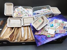 A box of loose stamps,