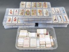 Approximately 70 full sets of cigarette cards, including football,