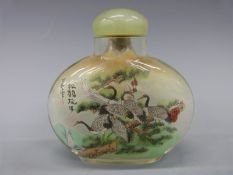 Chinese reverse painted glass scent bottle with hardstone stopper,