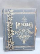 An Imperial postage stamp album (very lightly filled)