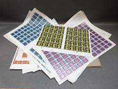 Complete sheets of Guernsey and GB stamps including £1 sheet of 100 stamps