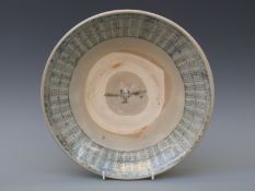 A Chinese blue and white bowl, from the Tek Sing cargo wreck of 1822, decorated in block pattern,