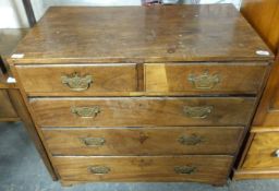 A Georgian oak chest of two over three graduated drawers raised on bracket feet (H86 x W92 x D51cm)