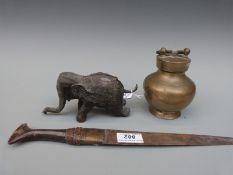 A Nepalese or Tibetan bronze elephant,