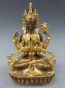 A bronze of multi armed Buddhist Deity Avalokiteshvara (22cm tall).
