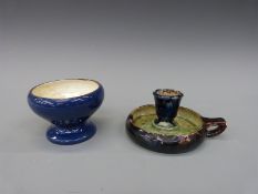 A Belgian pottery chamberstick,