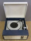 A c1960s portable electric record player, no label but thought to be Fidelity ,