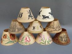 Nine hand painted paper lamp shades