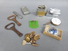 A continental silver pocket watch, a further military style watch in jewellery box, lighters,