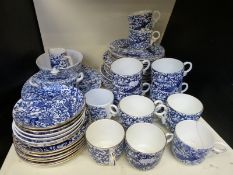 A Royal Crown Derby blue and white part tea and dinner service in Peacock pattern,