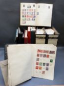A collection of all world stamps in two ring binders together with other stamp albums and