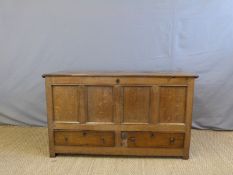 An 18thC/19thC oak silver or mule chest with lift up lid and two drawers (H81 x W140 x D55cm)