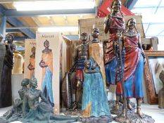 A collection of eleven Leonardo Collection & other resin Afrian Masai male & female figures,