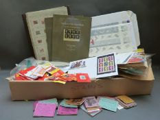 Two boxes of mainly loose all world stamps and a folder of mint blocks of GB stamps