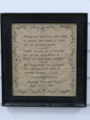 A framed Georgian sampler by Martha Turnock Nicol aged 8, floral border with verse to centre,