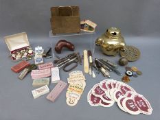 A quantity of bus or tram tickets, whistles, cork screws, compass, studs, stamps,