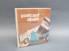 An album of WWI postcards, battle scenes, individual portraits,