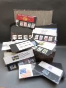 Two box files of GB presentation packs and cards of mint stamps