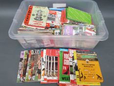 A large quantity of football programmes, including Swindon Town from 1950's cup finals,