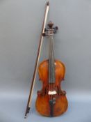 A Vintage violin, handwritten label not legible, 36cm flame two piece back,