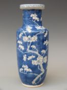 A 19thC Chinese vase decorated with prunus blossom and with four character mark to base,