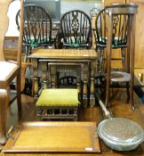 An oak nest of tables, tray, small stool, ottoman, bedpan, and a jardiniere.