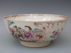 A 18thC Chinese export punch bowl decorated with figural scenes to the exterior and flowers to the