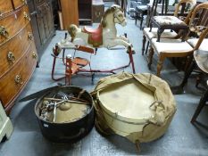 Triang bicycle and rocking horse and a drum kit.