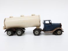 Tri-ang Minic clockwork tinplate Minic Dairies tanker with blue cab and cream tank
