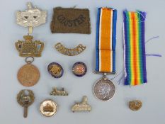 A WWI War Medal named to 20446 Pte H.L.Phelps Gloucestershire Regiment with M.I.