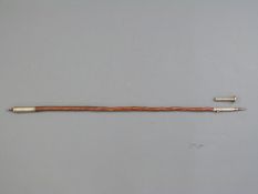 Spiked wooden walking cane with white metal top and base marked J Lapeylin,