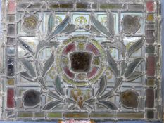 A late 19th/20thC Art Nouveau stained glass window of a crown amongst pomegranates,